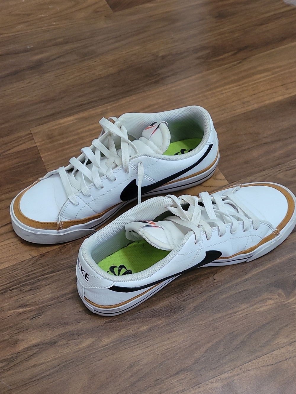 Nike Men’s White Low-Top Sneakers with Black Swoosh and Tan Accents